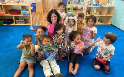 Lori Abreu reads ‘Mo’o and Koholā’ to MEO Head Start children